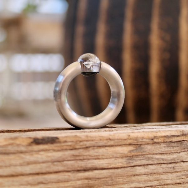 Außergewöhnlicher Schmuckewrk Edelstahl Ring mit schwebendem Diamant