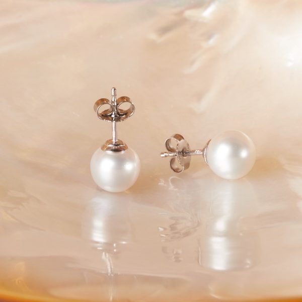 Zeitlose Gellner Südsee Perlen Ohrringe rund